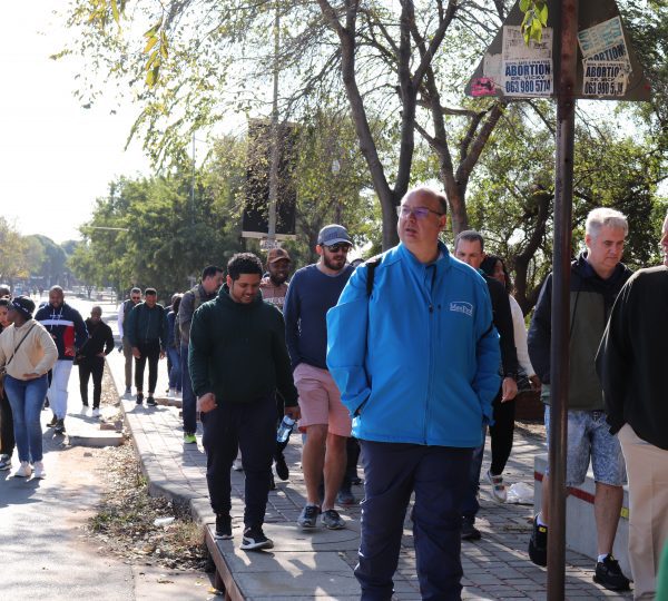 MaxProf employees walking through Vilakazi Precinct