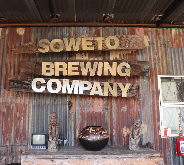 Sign of Soweto brewing company at the Ubuntu Kraal in Dube Soweto