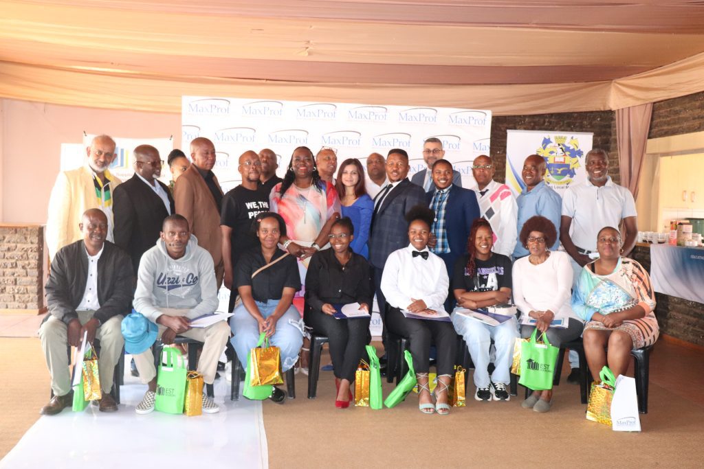Pictured: Executive Mayor Cllr. NB Khanye, members of the mayoral committee, along with bursars and parents.